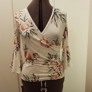 White blouse with pink roses